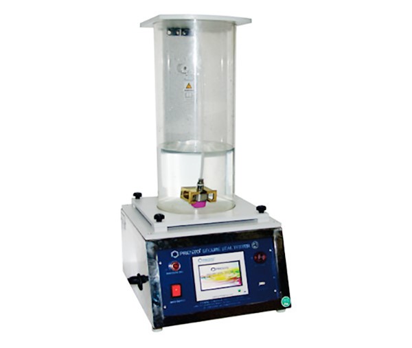 Instrument for testing the seal integrity of bottles